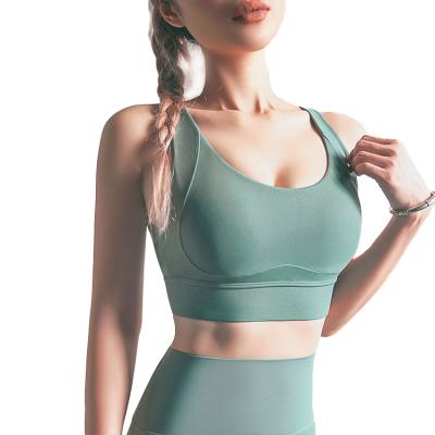 China Fitness Breathable Nude Sports Woman Adjustable Running Cross Back Plus Size Yoga Bra for sale