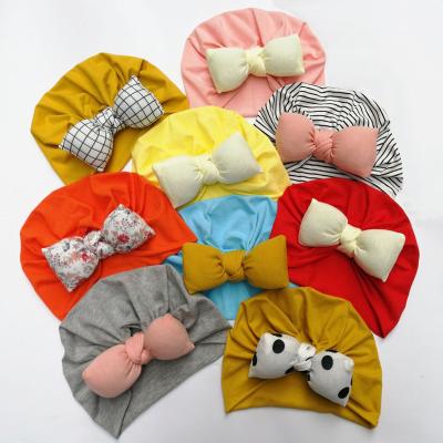 China Wholesale New Style Character Cute Knotted Baby Hat Customized Logo Baby Turban Hat for sale