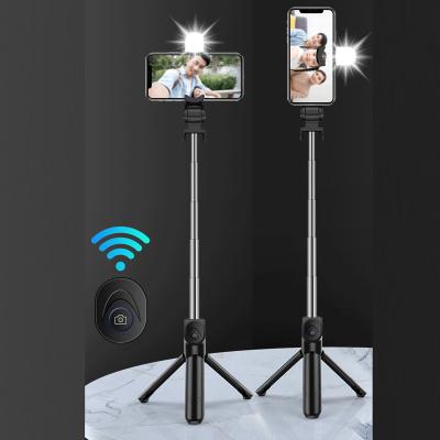 China Portable Flexible Wireless Selfie Stick 360 Degree Rotation Auto Face Tracking Tripod Selfie Stick for sale