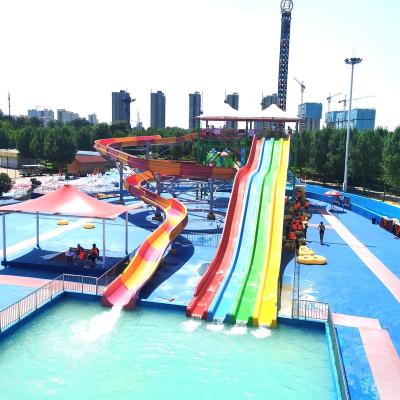 Cina Scivolo d'acqua a arcobaleno a più corsie con disegno e colore personalizzati per il parco acquatico in vendita