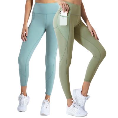 China 2021 High Waisted Workout Gaiters Yoga Pants Fashion Simple Four Way Stretch Elastane Women Breathable Yoga Pants With Pockets for sale