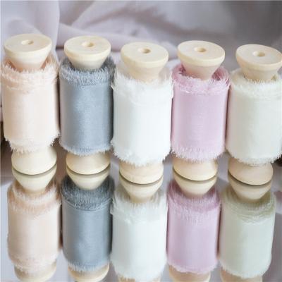 China 20mm-80mm double face crepe fringed edged ribbon by hand made pure silk habotai to wedding packgaed ribbon for sale