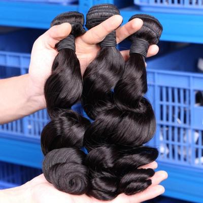 China Modern Show Wet Wavy Hair Weave Wholessale Price 1B# Malaysian Loose Wave Hair for sale