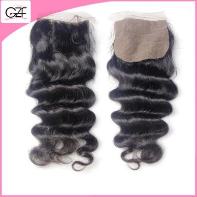 China Free Part Loose Wave Brazilian Hair Bundles with Silk Base Closures Virgin Hair Closure for sale