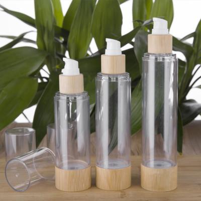 China Custom Bamboo Wooden Cosmetic Cosmetic Packaging Bottles Glass Cosmetic Bottle With Bamboo Pump for sale