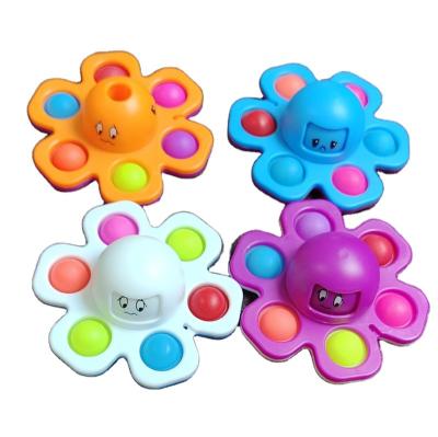 China Flip Octopus Push Bubble Relaxing Moving Person Interactive Luminous Main Chained Octopus Change Faces Plastic Silicone Spinner for sale