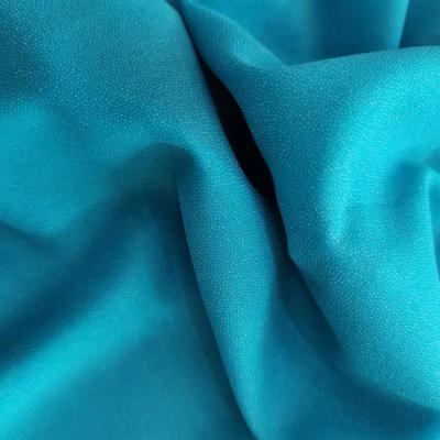 China Water Soluble High Quality 100% Polyester Easy Tear Away Backing Paper Interlining Fabric for sale