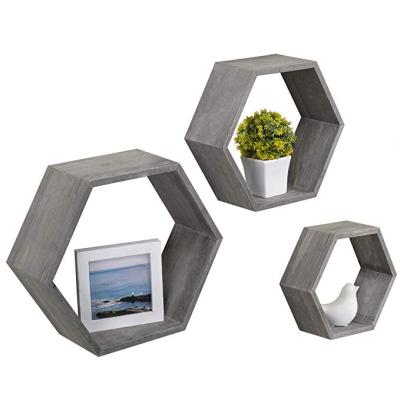 China MDF Eco-friendly Wooden Wall Shelf Wall Decor Hexagon Home Shelves for sale