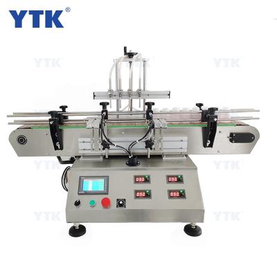 China YASON Food CNC Automatic Desktop Magnetic Pump Liquid Filling Machine with Conveyor for Perfume Filling Machine Water Filler for sale