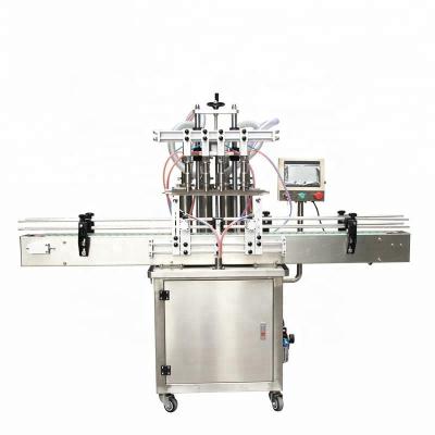 China Food Four Head Filling Machine Automatic Water Juice Shampoo Liquid Filler , Automatic Filler Heads With Conveyor PLC Control for sale