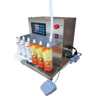 China Food Table Top Liquid Filling Machine Juice Milk Tea Drinking Water Liquid Filling Machine Price for sale