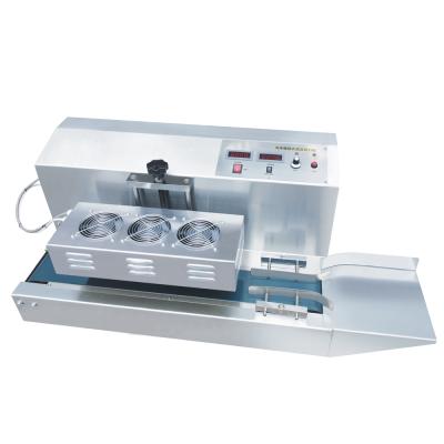 China Automatic Beverage Electro Magnetic Continuous Bottle Sealing Machine (20-50mm) for sale