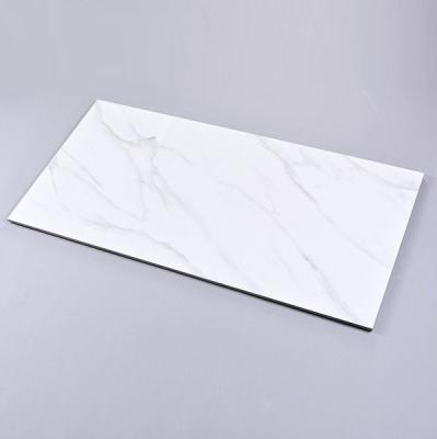 China Glazed Metallic White Ceramic Marble Tiles 600x1200mm Carrara Ceramic Marble Tile for sale