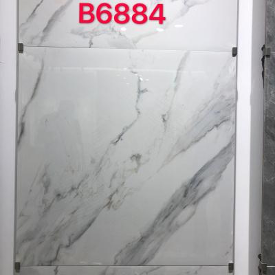 China Rustic Price Tile White Glossy Cararra Tiles 60x60 Nepal Porcelain Flooring Granite Tiles for sale