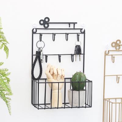 China Contemporary Wholesale Entryway Bathroom Shelf Metal Wire Storage Floating Basket With Hooks for sale