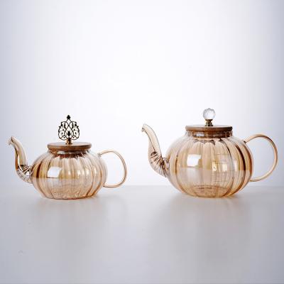 China New Arrival Sustainable High Borosilicate Heat Resistant Gold Coffee 400ml/600ml/800ml/1000nl/1200ml Glass Teapot With Handle for sale