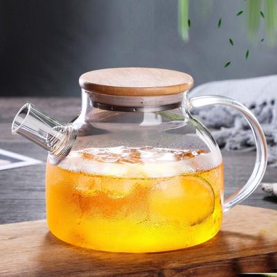 China Hot Selling Amazon Borosilicate Glass Water Borosilicate Borosilicate Borosilicate Glass Hot Viable Jug High Heat Resistant Glass Teapot With Bamboo Lid for sale