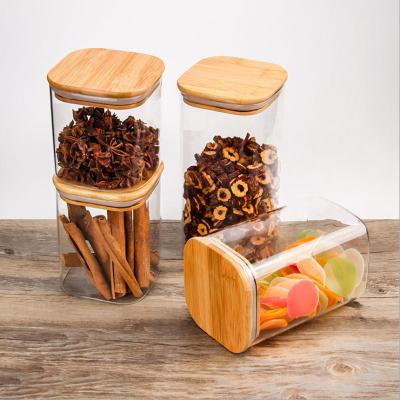 China Hot Sale 600ml/800ml/1000ml/1200ml/1400ml Freshness Preservation High Borosilicate Square Glass Storage Jar With Bamboo Wood Lid for sale