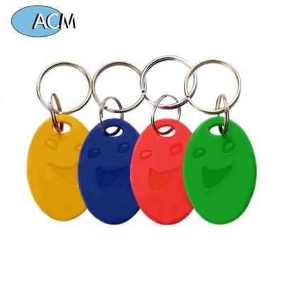 China Waterproof/Waterproof Type ABS RFID Fobs 125KHz TK4100 Proximity Door Smile Contactless Key Access Control Keyfob for sale