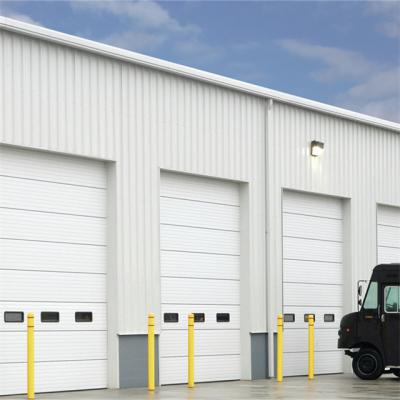 China IVertical Industrial Overhead Lift Warehouse Industrial Sectional Door for sale