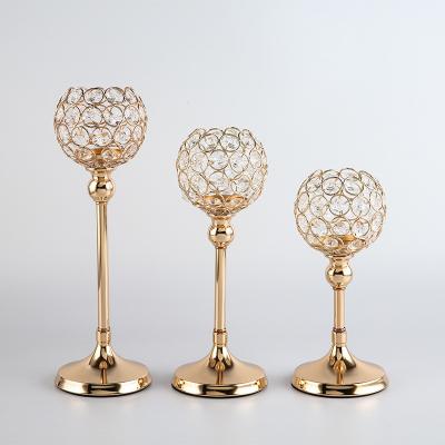 China Wholesale Romantic Glow Of A Candle Crystal Metal House Candle Holder Gold For Hotel And Restaurant Home Decor for sale