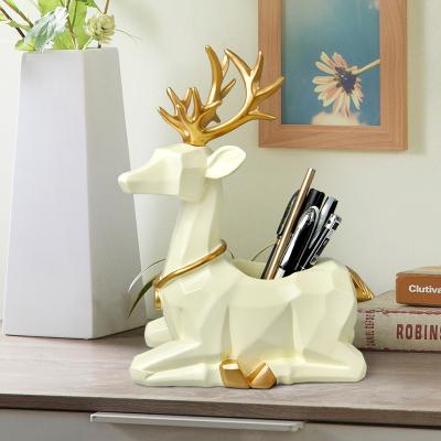 China Storage Desk Organizer Home Accessories Punched Powder Coated White Table Stand Resin Pencil Pen Desk Holder For Decor for sale