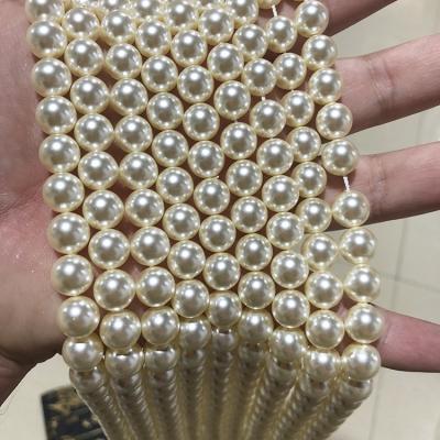 China High quality and competitive price stock bead 8mm crystal glass bead 620 cream color crystal glass beads for bracelet making for sale