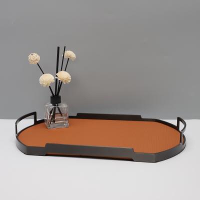 China Metal+leather Metal Tray Leather Creative Home Art Decoration Soft Storage Tray for sale