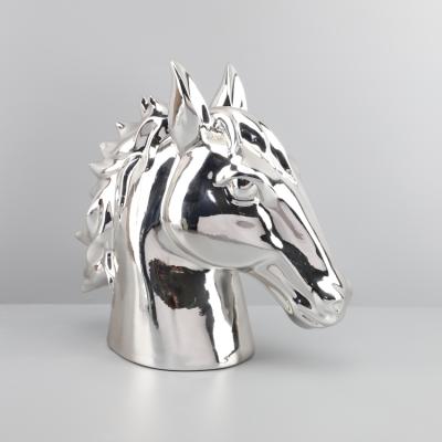 China Modern simple creative silver porch model study home hotel room decoration horsehead resin living room desk props for sale