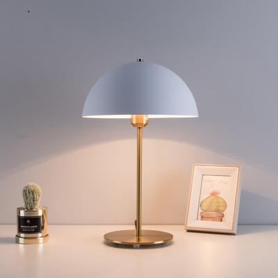 China Post-modern hot sales living room bedroom macaron desk lamp simple modern creative copper study bedside led table lamp for sale