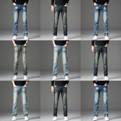 China Dark Blue Casual Multifunctional Straight Leg Jeans Men's Breathable Jeans Pants Fashion Men's Stretch Jeans Pants Paralimpiai for sale