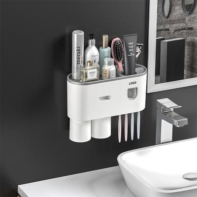 China Wall Mounted Sucker Set Bathroom Toothpaste Hook Toothpaste Dispenser Silicone Toothbrush Holder for sale