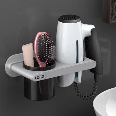 China New Viable No Drill Plastic Holder Wall Mounted Bathroom Hair Dryer Storage Rack for sale