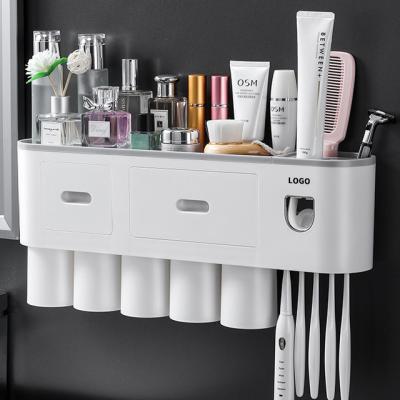 China Automatic Toothbrush Holder Viable Toothpaste Squeezer Dispenser Storage Rack Bathroom Accessories for sale