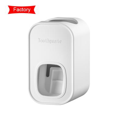 China Viable Accept Custom Logo Hands Free Automatic Toothpaste Dispenser Toothpaste Squeezer Wall-Mounted New Plastic Bathroom for sale