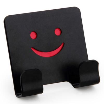 China Viable Funny Face Style Self-adhesive Aluminum Wall Robe Hook Towel Hook Kitchen Bathroom Robe Hook Funny Smiley Face for sale