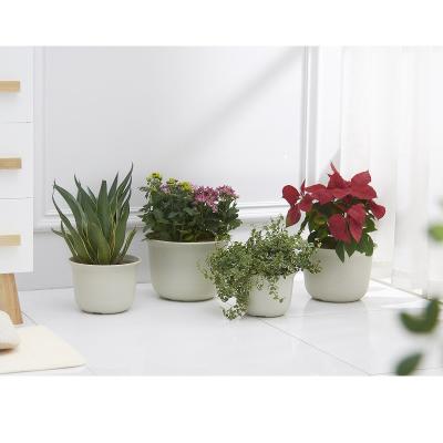 China CLASSIC Wholesale Modern Plastic Casual Planter Decorative Plastic Flower Pot Home / Gardening Use Minimalist Plastic Flower Pots for sale