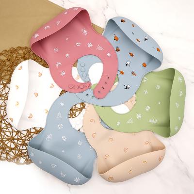 China Wholesale Customized Pattern Bpa Silicone Bib Printed Waterproof Baby Bib Sets Non-Toxic Comfortable Soft Free Silicone Baby Bibs for sale