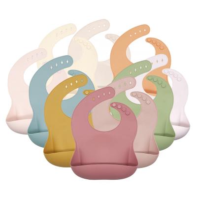 China Wholesale 2022 Newest Non-Toxic Baby Silicone Feeding Bib Set Adjustable Waterproof Bib Food Grade Bpa Free Silicone Baby Bibs for sale