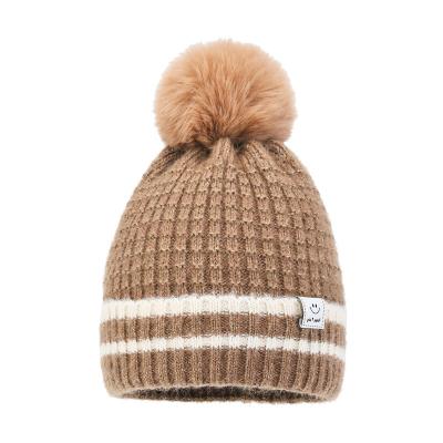 China MSYO Fashion Twist Stripe COMMON Wool Keep Warm Hat Plus Velvet Thickening Large Folding Hairball Stripe Women Knitting Hat for sale