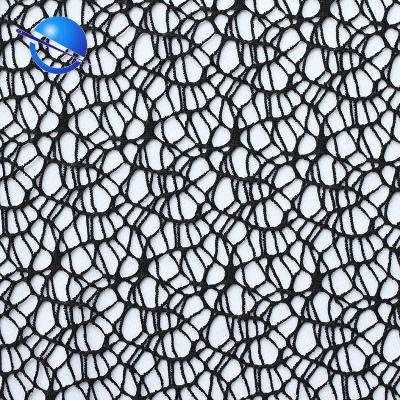 China Stocklot wholesale anti-static decoration spider net mesh fabric for fashion wear garment in weft jacquard knitted fabric for sale