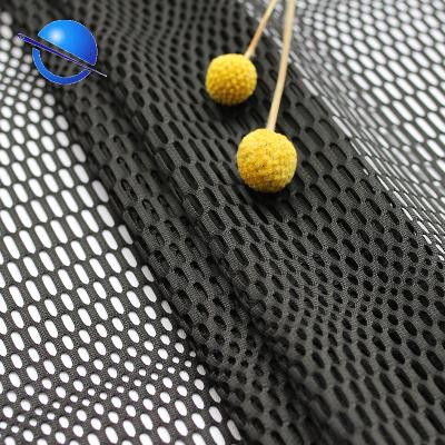 China Warp Knitted 100% Polyester Non Stretch Mesh Fabric Waterproof Big Hole For Clothes for sale