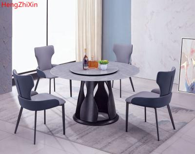 China (Other) Minimalistic Adjustable Modern Round Dining Table Set European Round Marble 6 Chairs Dining Table for sale