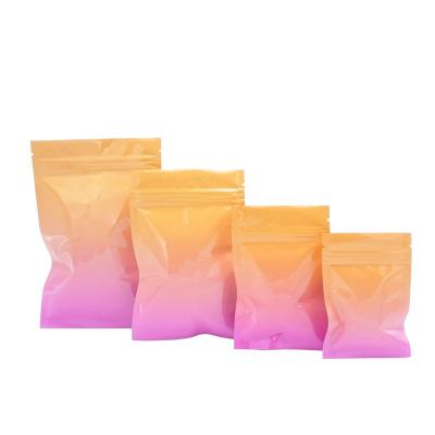 China 100 Rainbow Recyclable Holographic Foil Canister Bags With Clear Window Or Double Sided Color Seal For Candy for sale