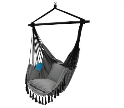 China Durable Outdoor Indoor Hammock Chair with Macrame Lace Fringe Tassel and Steel Spreader Bar with Pillow and Pocket for sale