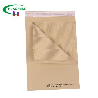 China Eco Friendly Degradable 100% Degradable Kraft Cover Paper 100% Recyclable Mailers Bag Cushion Corrugated Paper Wrapping Envelopes for sale