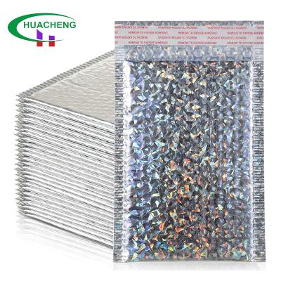 China Water Resistant Thick Silver Holographic Bubble Mailers Bags Good Padded Cushion Envelopes Multi-size Seal Closure Custom Envelopes For Mailing for sale