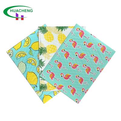 China Water Resistant Little Bubble Mailers 6x9 Print Flamingo Pattern Shipping Bags Aluminum Foil Film High Quality Custom Logo Postage Express Bags for sale