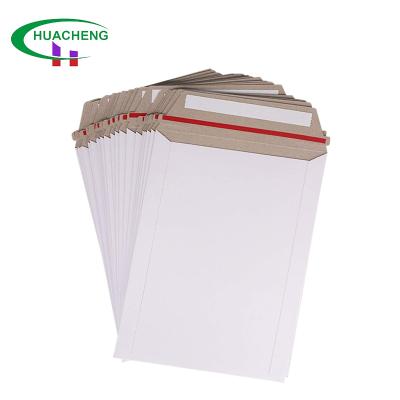 China Superior cushioning and exterior protection 100% recycled material eco-friendly 6x8 Cardbord thick mailers cardboard envelopes peel and self seal photo document mailers for sale