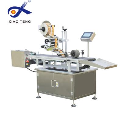 China PM-100A CLOTHING Paper Roll Automatic Paging and Card Label Printing Machine sparating sticker for sale